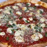 Red Margherita Pizza · Fresh mozzarella, chopped fresh basil and plum tomato sauce.