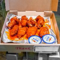 Hot Wings · 8 pieces with your choice of dipping sauce.