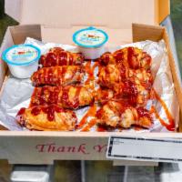 BBQ Wings · 8 pieces with your choice of dipping sauce.