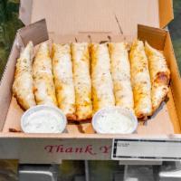 Beer Batter Cheese Bread Sticks · 8 pieces of fluffy beer batter dough covered with garlic butter, mozzarella and cheddar chee...