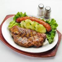 Sirloin Steak · Accompanied with rice, beans, salad and fried plantain.