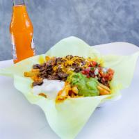 Super Fries · French fries with choice of meat, guacamole, sour cream, beans, cheese and Mexican salsa.