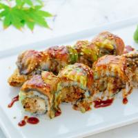 Spider Lover Roll (8 Pcs) · Soft shell crab tempura inside, topped with grilled eel, avocado and sesame, special sauce.