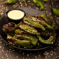 Shishito Peppers · Sea salt, sesame, lemon tahini sauce.