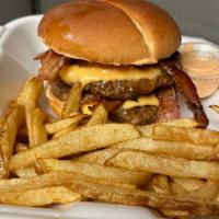 Double Bacon Cheeseburger  · 2  juicy and flavorful beef patties, a blanket of juicy and crispy bacon, and American cheese.