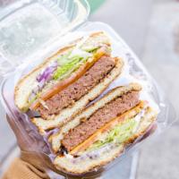 Classic Cheeseburger (VEGAN) · Beyond Burger, Lettuce, Tomato, Ketchup, Mayo & Follow Your Heart Cheese
