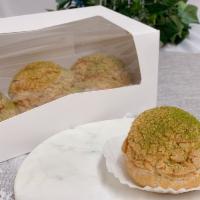 Matcha Puff (1pc) · 1 piece Daily Fresh baked Puff, Crispy exterior and creamy soft taste interior best combinat...
