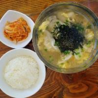 Rice Cake Dumpling Soup (Tteok Mandoo Guk) · Korean traditional soup made with Rice Cake, Mandoo (Chicken or Veggie), Beef, Egg, Scallion...
