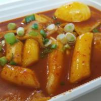 Tteokbokki (Spicy Rice Cake) · Rice cake, fish cake, boiled egg, scallion cooked in a Special spicy sauce.
