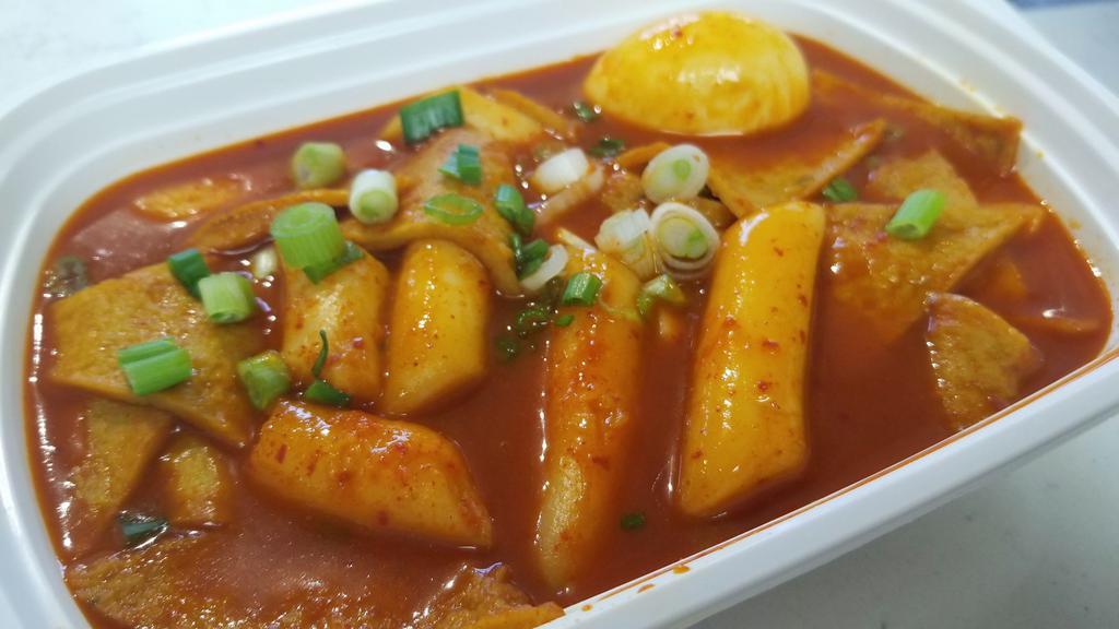 Tteokbokki (Spicy Rice Cake) · Rice cake, fish cake, boiled egg, scallion cooked in a Special spicy sauce.
