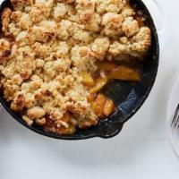 Homemade Cobbler · Cobbler is the ultimate treat! Biscuit style crust baked to perfection - Flavor options vary...