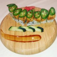 Supreme Veggie Roll · Carrot, avocado, cucumber, topped with sweet potato and jalapenos.