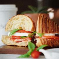 Caprese Sandwich · Fresh mozzarella, fresh basil, tomatoes and a special balsamic glaze all in our plain croiss...
