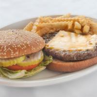 Cheeseburger · Served with lettuce and pickle garnish.