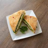 Avocado Melt Sandwich · Comes with avocado, turkey breast, spinach, mozzarella cheese, feta cheese, and fresh made b...