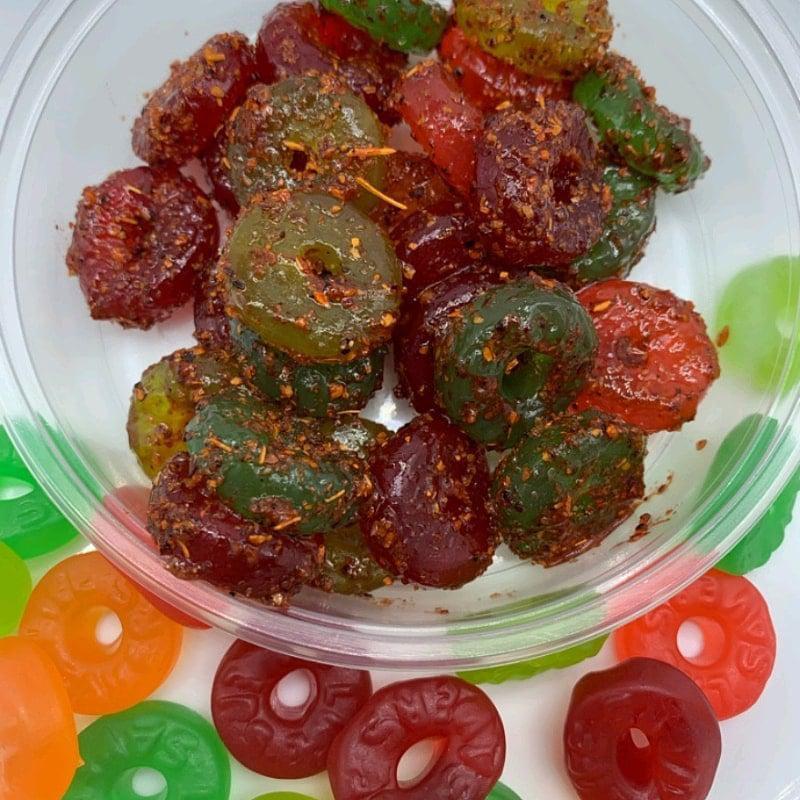 Chamoy Rings · Lifesavrs coated with chamoy and tajin