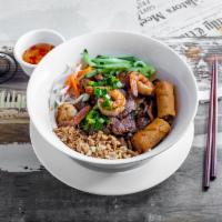 B63. Bun Tom Thit Nuong Cha Gio · Grilled shrimp, pork, and egg rolls.