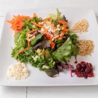 Rawsome Remix Salad · Spring mix, kale, bell pepper, cucumber, carrots, almonds, quinoa, and craisins.