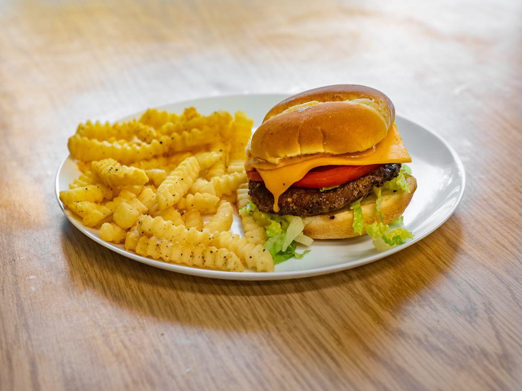 Rogue Burger · Quarter Pound Beef Patty, Cheddar Cheese, Lettuce, Tomato, and Onion on a Toasted Bun served with fries.