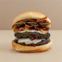 Rodeo Double Cheeseburger · Certified Angus Beef.  This double cheeseburger has some kick.  It comes with Sante Fe BBQ s...