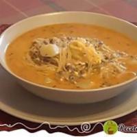 Sopa a la Minuta · Milk based beef consome with noodles.