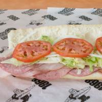 Tubby's Famous Sub · Cotto salami, hard salami, ham, cheese, onions, lettuce, tomatoes and Tubby's famous dressing.