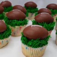 6 Football Ring Cupcakes · 6 of our amazing cupcakes are iced in green buttercream and topped with a football ring!  