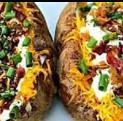 Loaded Baked Potato · Served with nacho cheese, green onions, sour cream, and bacon bits. Your choice of style. Ma...