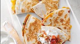 Quesadilla Grande · Extra-large on a flour tortilla with tons of melted cheese, pico de gallo, and sour cream. Y...