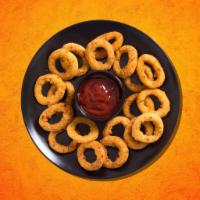 Onion Rings · A ring of slice onion coated with batter , crumbs and deep fried.
