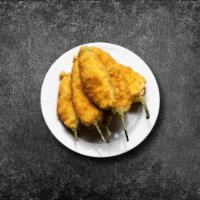 Just Jalapeno Poppers · Breaded jalapeno poppers filled with cheese and fried to golden perfection.
