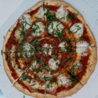 Margherita Pizza · Tomato sauce, fresh mozzarella and fresh basil.