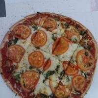 Vegetarian Pizza · Mushroom, green pepper, onion, spinach and sliced tomato.