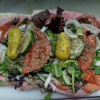 Italian Sub · Italian lunch meat with lettuce tomato and seasoning.