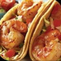 Tacos de Camaron · 2 tacos with grilled shrimp topped with lettuce, diced tomatoes and a side of rice.