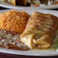 Chimichanga · A stuffed flour shell with your choice of ground beef or spicy chicken, deep-fried to a gold...