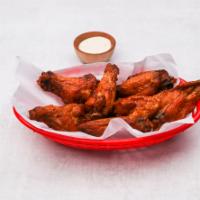Chicken Wings · Cooked wings of a chicken coated in sauce or seasoning. Plain or breaded. Sweet and spicy As...