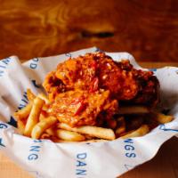 Thai Chili Buffalo Wings (GF) with Fries by Dang Good Wings All Day · By Dang Good Wings All Day. 6 jumbo wings with house blend of chili and buttery buffalo sauc...