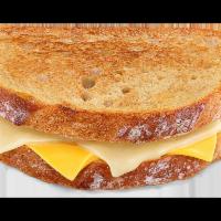 Grilled Cheese · Toasted Sourdough bread with white cheddar and American cheese. Max 12 per order.