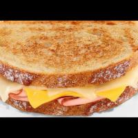 Grilled Ham & Cheese · Toasted Sourdough bread with ham, white cheddar and American cheese. Max 12 per order.
