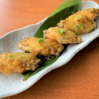 Tebasaki · Japanese style deep-fried chicken wings with pepper and yuzu sauce.