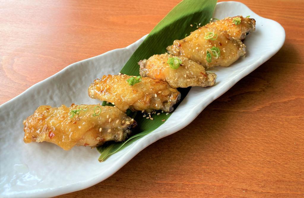 Tebasaki · Japanese style deep-fried chicken wings with pepper and yuzu sauce.