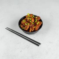 General Gau's Chicken · Marinated chicken deep-fried, then sauteed on a spicy ginger and garlic sauce. Hot and spicy.