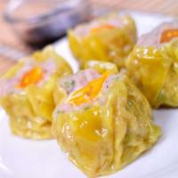 Dumplings · Steamed shrimp and pork, garlic, ginger-infused soy sauce
