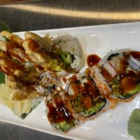 Spider Roll · Raw. Softshell crab tempura, avocado, cucumber, crab meat imitation and tobiko with
sesame s...