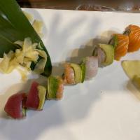 Rainbow Roll · Imitation crab meat, cucumber with avocado, tuna, salmon, shrimp and red snapper on top.