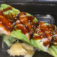 Tiger Skin Roll · Crabmeat imitation and spicy scallop inside with shrimp & avocado on top.