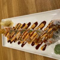 Shaggy Dog Roll · Shrimp tempura, avocado, imitation crabmeat and sesame with special sauce.