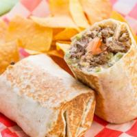 Burrito · Flour tortilla wrapped with your choice of meat, rice, beans, sour cream, pico de gallo, gua...