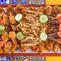 Picada Party Plate · Picada beef, pork, sausage, chicken, breaded shrimp, chicken wings, chips, fries and fried p...